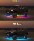 Black SUV with Car Underglow Lights RGBIC Kit With 16 Million Colors And 45 Scene Modes, glowing in RGBIC and RGB colors at night.