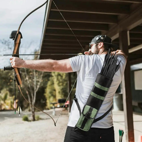 Archer using Lightweight Back Arrow Quiver With MOLLE System in army green, adjustable holder, bow hunting outdoors.