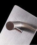 Close-up of Heavy Duty Adhesive Wall Hooks That Are A Total Game Changer For Bathroom And Kitchen Organization Rust Proof Metal Hangers.