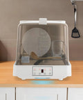 No Fuss Compact Countertop Dishwasher With Six Auto Wash Cycles And Swivel Spray Head Sturdy Waterproof Build Great For Small Apartments RV Campouts Or College Dorms on wooden kitchen counter.