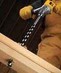 Worker using Ship Auger Drill Bit For Hardwood And Nail Embedded Wood, 1 Inch By 17 Inch, Self Feed Spur Tip, Hardened Alloy Steel