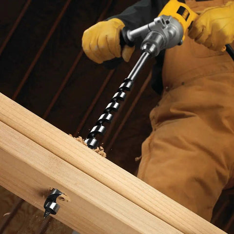 Worker using Ship Auger Drill Bit For Hardwood And Nail Embedded Wood, 1 Inch By 17 Inch, Self Feed Spur Tip, Hardened Alloy Steel