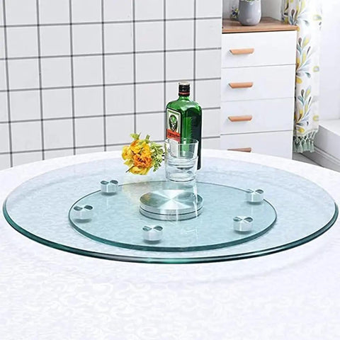 360 Degree Tempered Glass Lazy Susan Turntable With Silent Rotation on table, featuring heavy duty serving tray and anti roll over design.