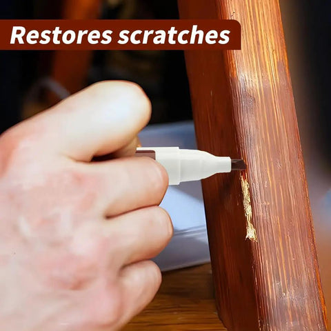 Person using Wood Repair Markers Touch Up Kit For Stains And Scratches On Wooden Floors Tables And Furniture Oak Color Quick Dry