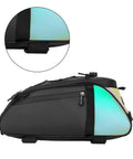 Side view of Rear Rack Bike Bag 12L Water-Resistant Trunk Pannier With Reflectors, close-up on attachment strap, black color
