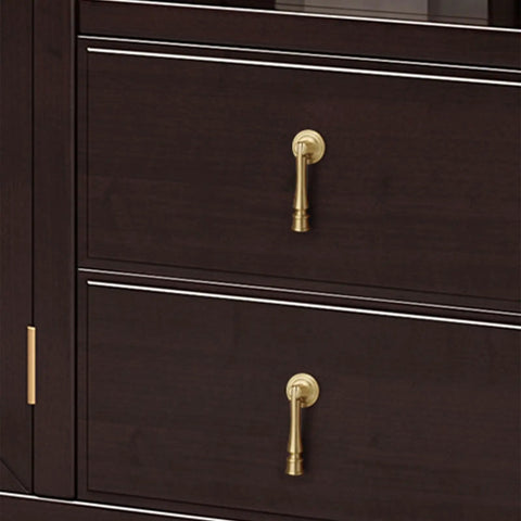 Slick Eight Piece Set Of Black Solid Brass Cabinet Knobs And Drop Style Pulls For Kitchen Drawers And Cupboards With Dang Tough Screw Mount Hardware That Brings Badass Retro Charm To Your Home showing golden drop handles on dark drawers.