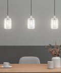 Three Pack Crystal Hanging Pendant Lights 5.5 Inch With Brushed Nickel Finish displayed over a dining table
