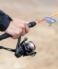 Close-up of angler casting with Royale Legend Spinning Reel With Dual Gear Ratios Five Point Two To One And Six Point Two To One Carbon Drag