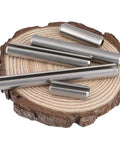 M3x10mm Spring Tension Pins 25Pcs A2 Stainless Steel Roll Pins Split Pins on a wood surface
