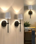 FRIDEKO HOME Black Battery Operated Wall Sconces Set of 2 Small, 12.2in. displayed with remote control and warm light settings.