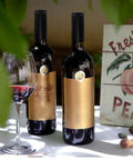 Sleek Black Wine Bottle Shrink Caps Engineered For Fast Heat Shrink Sealing Hella Durable Premium PVC Build Dead On Freshness Lock For Home Cellars Professional Craft Bottling And Bar Setup 50 Pack on wine bottles with glass.