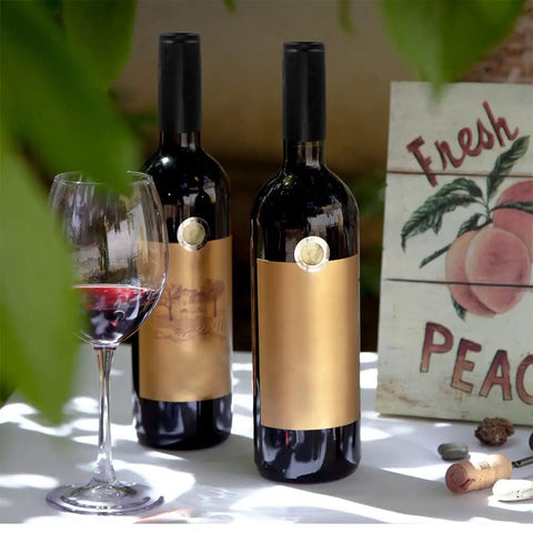 Sleek Black Wine Bottle Shrink Caps Engineered For Fast Heat Shrink Sealing Hella Durable Premium PVC Build Dead On Freshness Lock For Home Cellars Professional Craft Bottling And Bar Setup 50 Pack on wine bottles with glass.
