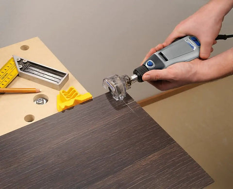 Quick Swap Mini Saw Rotary Tool Accessory For Boss Grade Perpendicular Cuts Up To Quarter Inch in use cutting laminate wood.