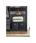 Freestanding Wooden Closet System Featuring Modular Cubbies And Hanging Rods Delivers Totally No Sweat Customizable Wardrobe Storage For Clothes Shoes And Accessories In Sleek Gray with shelf holding luggage and storage bins.