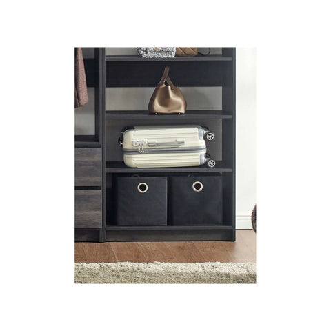 Freestanding Wooden Closet System Featuring Modular Cubbies And Hanging Rods Delivers Totally No Sweat Customizable Wardrobe Storage For Clothes Shoes And Accessories In Sleek Gray with shelf holding luggage and storage bins.