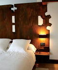 Bedroom with rust effect metal wall panels created by Rust Activator For Metal Effects 1 Gal PA904 Water Based Acidic Solution
