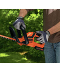 Powerful 20V Max Cordless Hedge Trimmer No-Fuss 22 Inch Dual Action Steel Blade Tool in use trimming hedges