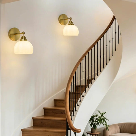 Feasey Vintage Milk Glass Globe Wall Sconce, Mid Century Ribbed Glass Light on a curved staircase wall.