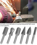Heavy Duty Tungsten Carbide Burrs Six Pack Built Tough For Wood Carving And Metal Engraving With 6mm Shank top view of grinding bits in use