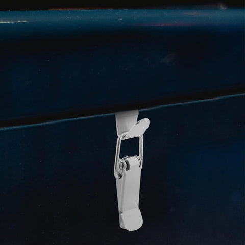 Stainless Steel Box Latches With Hook Design No Keyhole Needed Spring Loaded Toggle Clasp on a dark storage box
