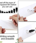 20 Pack Dry Erase Name Tent Cards With Black Markers being used, showing easy wipe feature, ideal for meetings and events