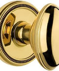 Soleil Rosette Passage Door Set With Eden Prairie Knob In Lifetime Brass Finish, Solid Forged Brass Construction, side view close-up