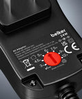 Close-up of Universal 24W Multi Voltage AC DC Power Adapter with adjustable voltage dial and input specifications