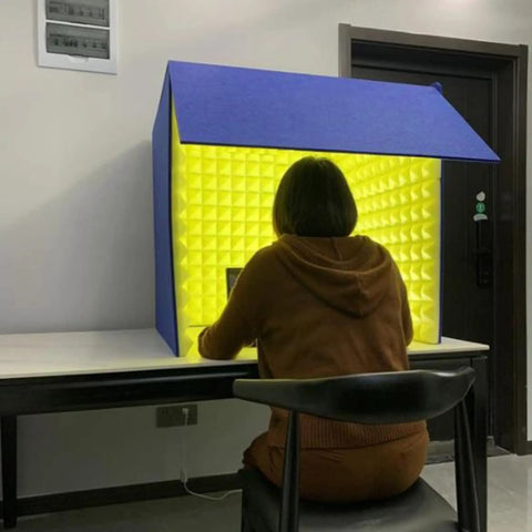 Solid Portable Desktop Soundproof Booth Cube Packed With Dense Acoustic Foam Panels For Dead Silent Mic Takes Home Studio Vocal Tracking And Room Noise Culling, viewed from behind.
