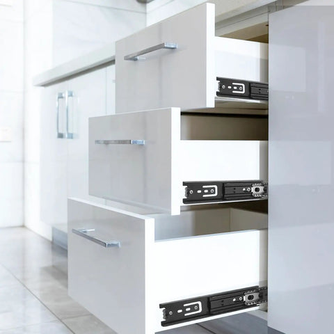Close-up view of kitchen drawers with Seven Pair Eight Inch Black Soft Close Drawer Slides Heavy Duty Steel Ball Bearing Gliders.