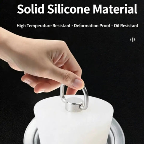 Close-up of Silicone Drain Stopper with Pull Ring, Bathtub Drain Stoppers showing solid silicone and stainless steel pull ring.