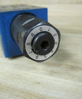 Hydraulic Check Restriction Z2FS 6-5-44/2QV Single Unit R900476838 pilot-operated spool close-up on wooden surface