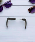 Black European style gate handle with lock pin, set against a white background with sunglasses around; Vintage Rustic Metal Pulls For Wooden Fence Gates, Garden, Patio, Shed, And Garage Door Hardware Set, Built Tough, DIY Ready, Secure And Easy To Use