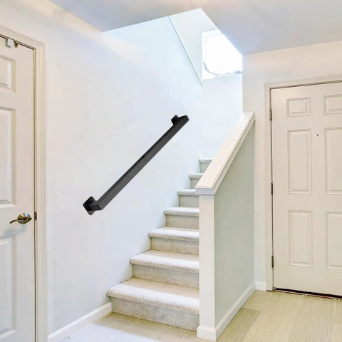Badass 6ft Black Wrought Iron Stair Railing Wall Mount Kit Non Slip Handrail And Iron Grab Bar Perfect For Indoor Stairs Boosts Safety While Looking Sweet On Your Home Decor Stylish Metal Banister attached to white wall near carpeted stairs.