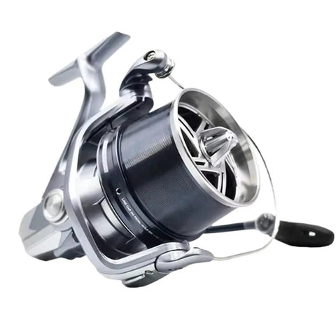 Close-up of a silver surf reel for lake and ocean spinning fishing reels with eight bearings left handed operation interchangeable handle