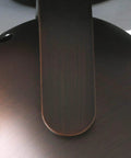 Close-up of the Urban Bronze finish on One-Light Roundback Track Lighting Fixture With Adjustable Head For Indoor Ceiling And Wall Sconce.