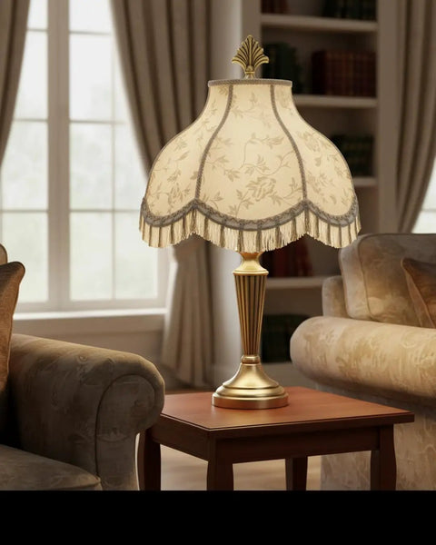 Off White Jacquard Scallop Bell Lamp Shade With Fringes, Spider Construction displayed on table in elegant living room