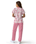 Woman wearing Hot Pink Scrubs Tops And Pants Set For Women Perfect For Nurses Veterinary Techs Dental Hygienists And Pet Groomers