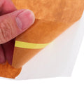 Close-up of hand peeling Beefy Heavy Duty Packing Tape For Cardboard Boxes With High Adhesion And Easy Tear Strip
