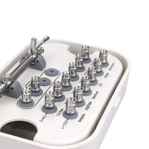 White container holding Universal Screwdriver Implant Tool Kit with 12 drivers and wrench for 8.5mm and 13.5mm bits.