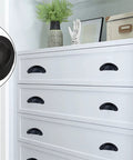 White dresser with black cup pulls from 20 Pack Cup Pull Cabinet Hardware Set With Screws, Three And One Sixth Inch Total Length, Two And One Half Inch Center To Center Hole, One And Three Eighths Inch Wide Cup Pulls For Cabinets And Drawers, Includes Convenient Screws.