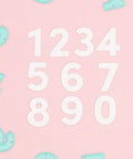 Number Shaped Die Cut Set, 0 Through 9, For Card Making And Scrapbooking, 10 Piece Die Cuts on pink background