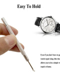 Close-up of hand holding tool from 6 In 1 Watch Hands Repair Kit With 3 Hand Pressers And 2 Removers, Precision Pusher Set displayed.