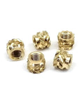 Close-up of premium brass knurled nuts for hot melt injection molding, highlighting ultra smooth high precision threads.