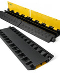 Two Pack Two Channel Cable Ramp Set With 22000 Lb Axle Capacity Heavy-Duty Rubber Cord Protector in black and yellow