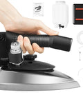Hand holding Pro Grade 1200W Electric Steam Iron With Gravity-Feed System And Large Water Tank For Quick Presses Machine
