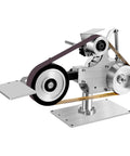 No-Fuss Mini Belt Sander And Bench Grinder Pro Combo featuring knife sharpener adapter on an aluminum base for precision sanding.