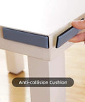 Applying 8 Pack Self-Adhesive Furniture Glides 25mm x 100mm Rectangle Sliders on table for floor protection and quiet glide.