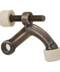 Legit Heavy Duty Hinge Pin Door Stop In Authentic Antiqued Brass Finish With Slick Rubber Cushion Bumpers For Silent Interior Door Swing No Sweat Quick Install showing close-up of detail and bumpers.