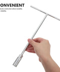 Ergonomic Steering Wheel T Handle Socket Wrench Made From Tough American Steel For Motorcycle Repair Saves Knuckles And Locks Onto Stubborn Bolts With Ease Perfect For Weekend Grinds And Serious Shop Work, being held in hand.