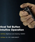 Tactical tail button on 3500 Lumen USB C Rechargeable EDC Flashlight With Clip And Lanyard, worn by gloved hand for intuitive use.